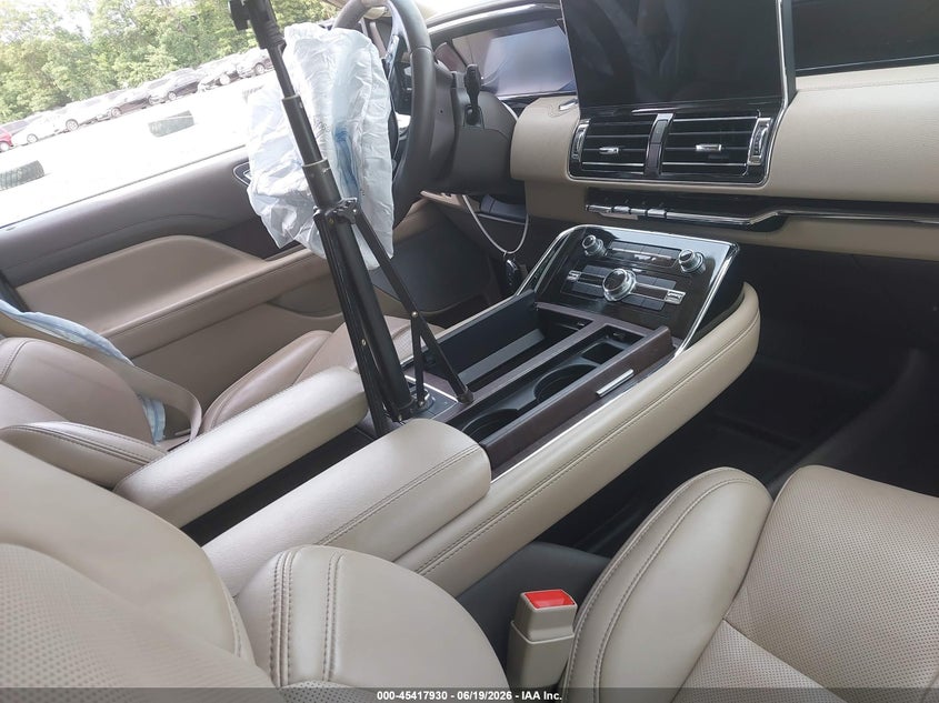 2024 Lincoln Navigator VIN 5LMJJ3LG1REL10453 IAAI salvage auction — FRONT & REAR, Salvage Title, sold $16,600 on 2026-09-28 (photo 5)
