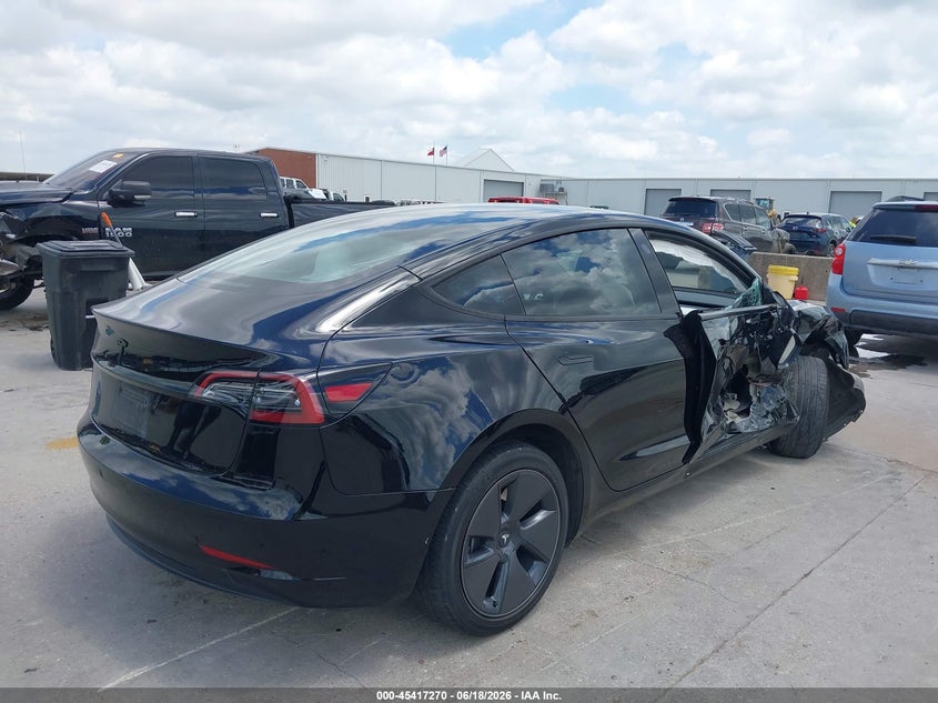 2023 Tesla Model 3 VIN 5YJ3E1EA9PF698190 IAAI salvage auction — RIGHT SIDE, Original (Texas), sold $4,950 on 2026-08-27 (photo 4)