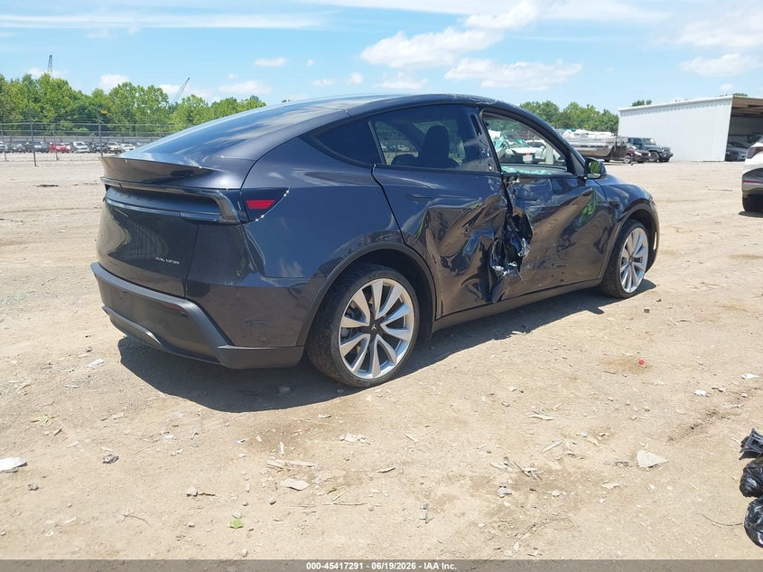 2026 Tesla Model y VIN 7SAYGDEE6TA475829 IAAI salvage auction — RIGHT SIDE, Salvage (Tennessee), sold $26,200 on 2026-07-15 (photo 4)