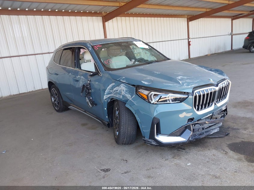 2026 BMW X1 VIN WBX73EF00T5524785 IAAI salvage auction — FRONT & REAR, Salvage (California), sold $3,650 on 2026-07-09 (photo 1)