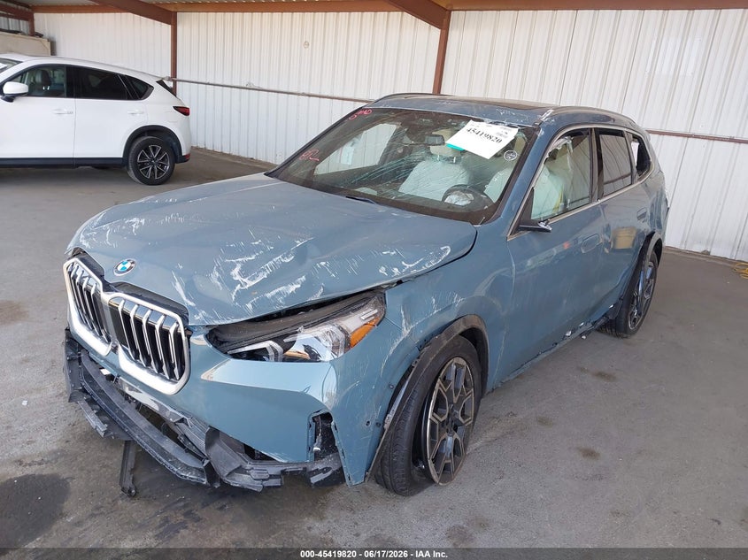 2026 BMW X1 VIN WBX73EF00T5524785 IAAI salvage auction — FRONT & REAR, Salvage (California), sold $3,650 on 2026-07-09 (photo 2)
