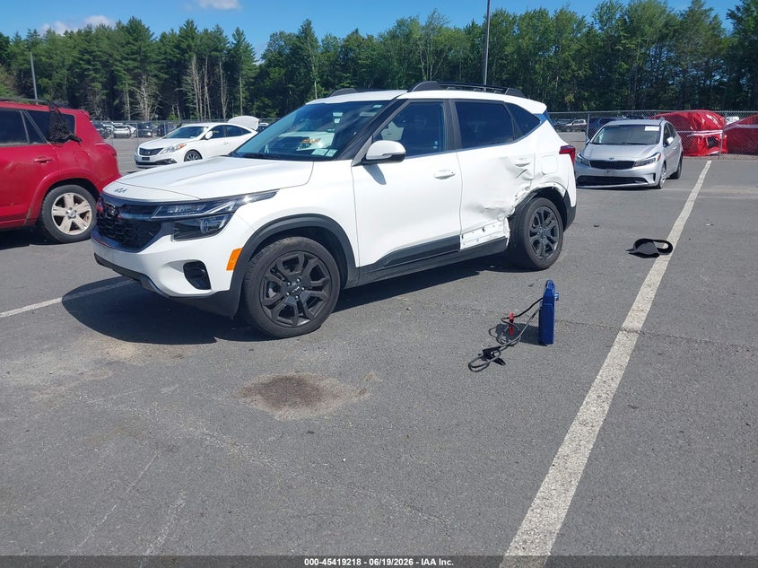 2024 Kia Seltos VIN KNDEUCA74R7587377 IAAI salvage auction — LEFT SIDE, Mv-907A (New York), sold $8,000 on 2026-07-16 (photo 2)