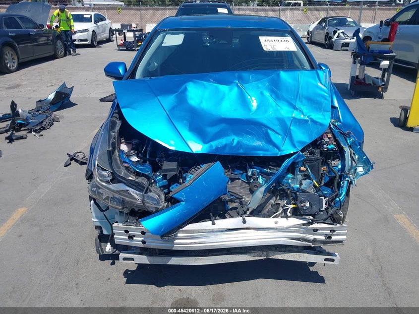 2021 Toyota Prius VIN JTDKAMFU6M3130179 IAAI salvage auction — NORMAL WEAR, Salvage (Texas), sold $4,000 on 2026-07-29 (photo 6)