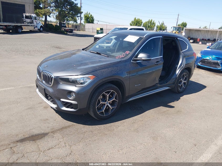 2018 BMW X1 VIN WBXHT3C33J5K31144 IAAI salvage auction — LEFT SIDE, Salvage Title, sold $4,950 on 2026-07-15 (photo 2)