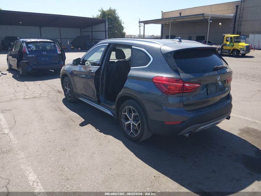2018 BMW X1 VIN WBXHT3C33J5K31144 IAAI salvage auction — LEFT SIDE, Salvage Title, sold $4,950 on 2026-07-15 (photo 3)