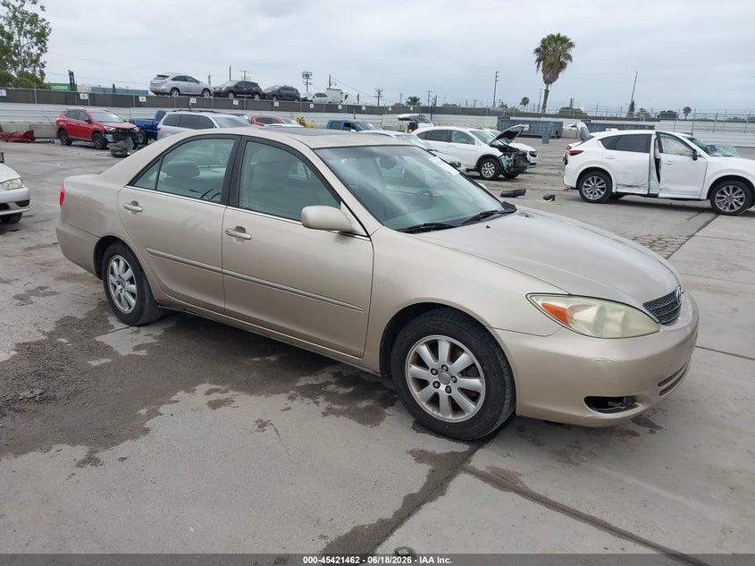 2002 Toyota Camry VIN JTDBF30KX20004876 IAAI salvage auction — REAR END, Salvage (California), sold $900 on 2026-07-29 (photo 1)