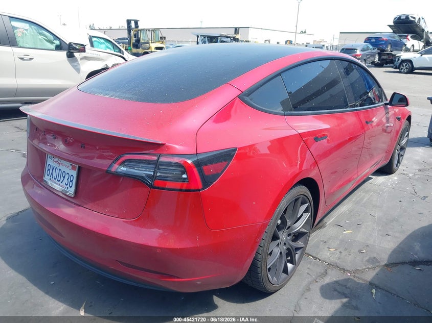 2021 Tesla Model 3 VIN 5YJ3E1EB1MF034888 IAAI salvage auction — LEFT SIDE, Salvage Title, sold $6,300 on 2026-07-29 (photo 4)