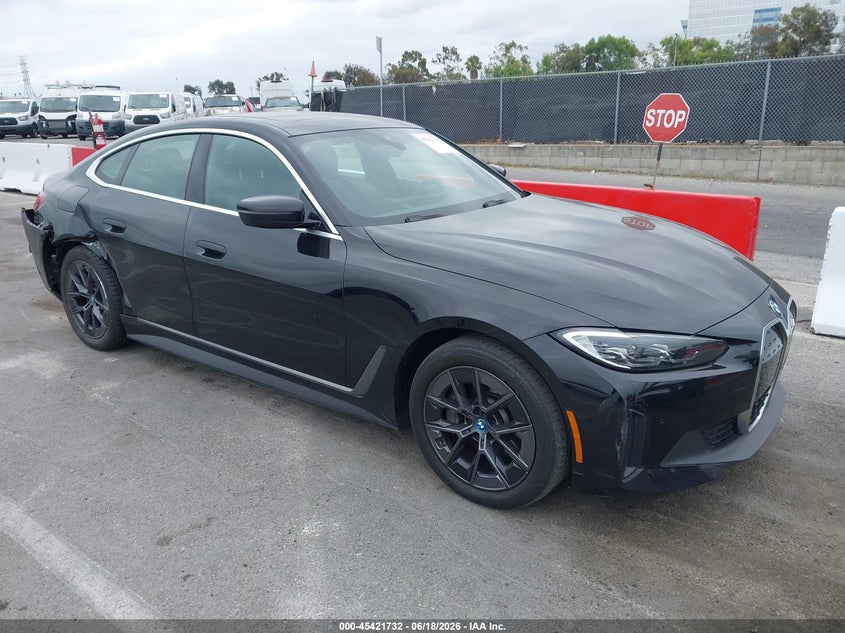 2024 BMW I4 VIN WBY43AW01RFT37730 — IAAI salvage auction photo