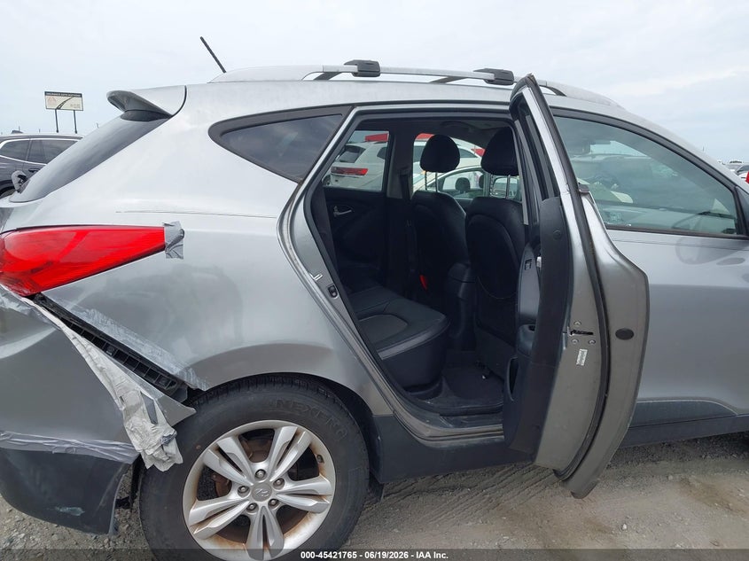 2013 Hyundai Tucson VIN KM8JU3AC5DU667904 IAAI salvage auction — REAR END, Salvage (Arkansas), sold $1,025 on 2026-07-29 (photo 8)