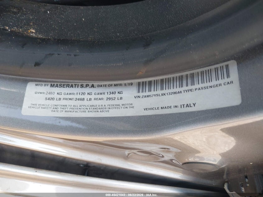 2019 Maserati Ghibli VIN ZAM57YSLXK1329644 IAAI salvage auction — BIO HAZARD, Salvage Title, sold $100 on 2026-09-08 (photo 9)
