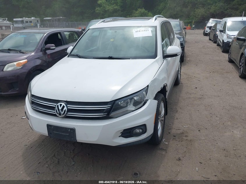 2013 Volkswagen Tiguan VIN WVGBV3AX3DW057170 IAAI salvage auction — NORMAL WEAR, Clear (Massachusetts), sold $400 on 2026-07-14 (photo 2)