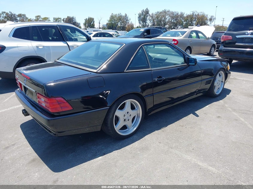 1991 Mercedes-benz 500 VIN WDBFA66E1MF029215 IAAI salvage auction — NORMAL WEAR, Salvage Title - Dealer (California), sold $5,800 on 2026-07-09 (photo 4)
