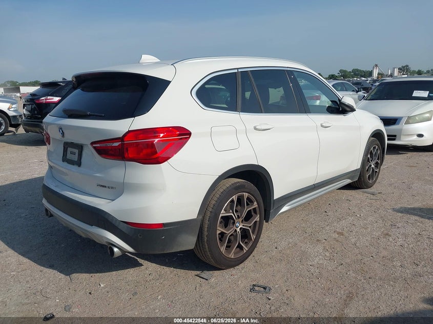 2020 BMW X1 VIN WBXJG7C04L3L81684 IAAI salvage auction — SIDE, Salvage Title, sold $6,200 on 2026-08-02 (photo 4)