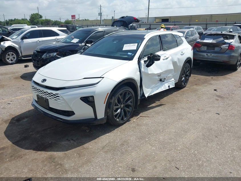 2025 Toyota Crown signia VIN JTDACAAJ4S3034212 IAAI salvage auction — SIDE, Salvage (Texas), sold $18,000 on 2026-07-22 (photo 2)