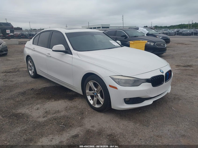 2015 BMW 3er VIN WBA3C3G5XFNS74385 IAAI salvage auction — WATER/FLOOD, Junk (Oklahoma), sold $1,125 on 2026-07-28 (photo 1)