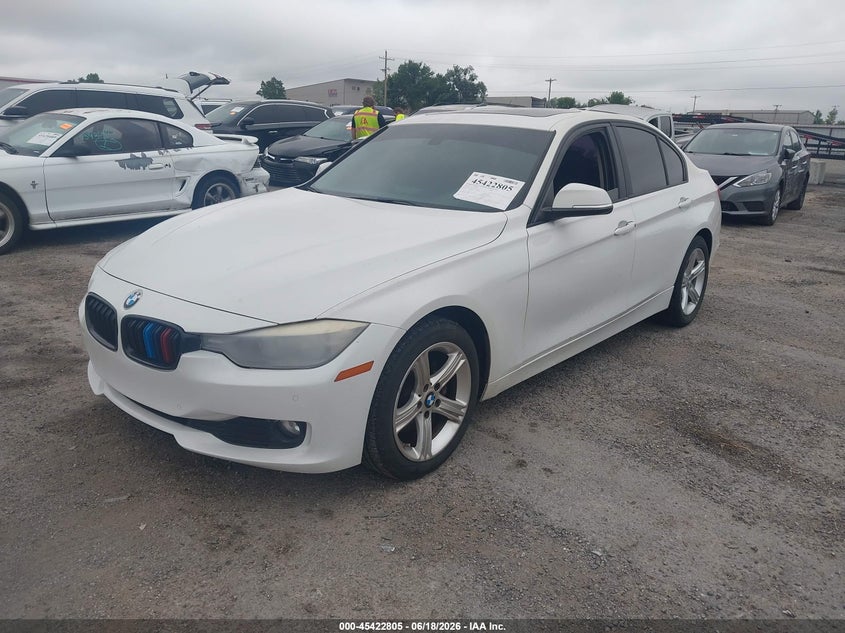 2015 BMW 3er VIN WBA3C3G5XFNS74385 IAAI salvage auction — WATER/FLOOD, Junk (Oklahoma), sold $1,125 on 2026-07-28 (photo 2)