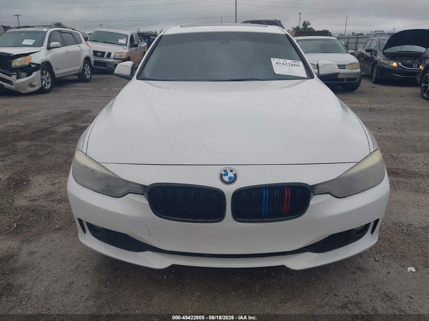2015 BMW 3er VIN WBA3C3G5XFNS74385 IAAI salvage auction — WATER/FLOOD, Junk (Oklahoma), sold $1,125 on 2026-07-28 (photo 6)
