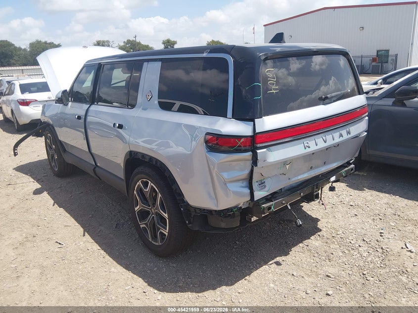 2025 Rivian R1s VIN 7PDSGBBA5SN046704 IAAI salvage auction — FRONT & REAR, Salvage Title, sold $13,200 on 2026-07-23 (photo 3)