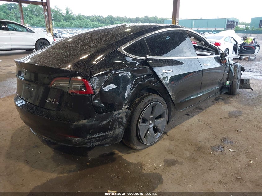 2018 Tesla Model 3 VIN 5YJ3E1EB7JF182295 IAAI salvage auction — ROLLOVER, Salvage Title, sold $1,300 on 2026-07-28 (photo 4)