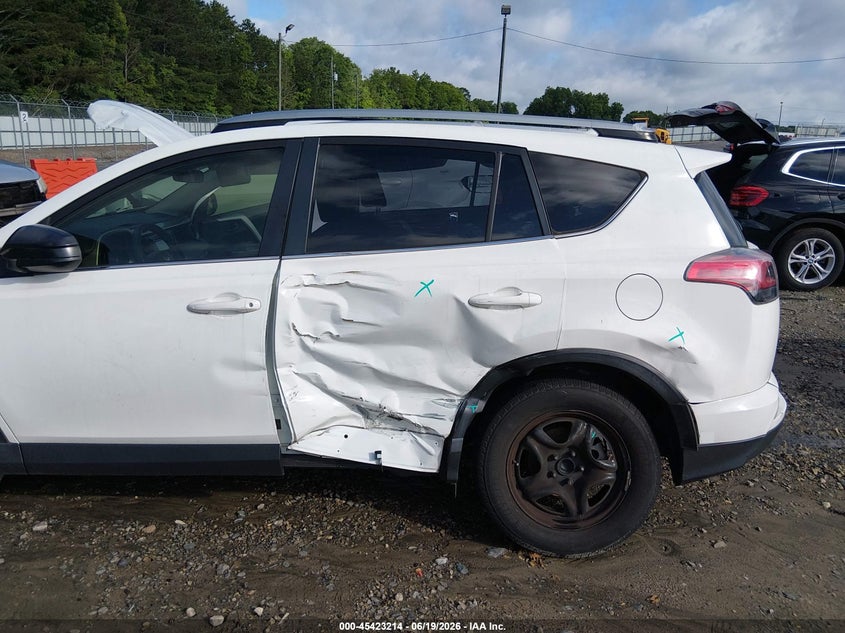 2017 Toyota Rav 4 VIN JTMZFREVXHJ715744 IAAI salvage auction — SIDE, Salvage (Georgia), sold $3,650 on 2026-07-20 (photo 6)