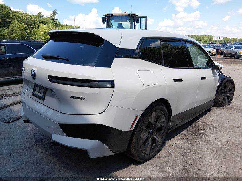 2025 BMW Ix VIN WB523CF05SCU31200 IAAI salvage auction — RIGHT FRONT, Salvage (Massachusetts), sold $24,200 on 2026-09-01 (photo 4)