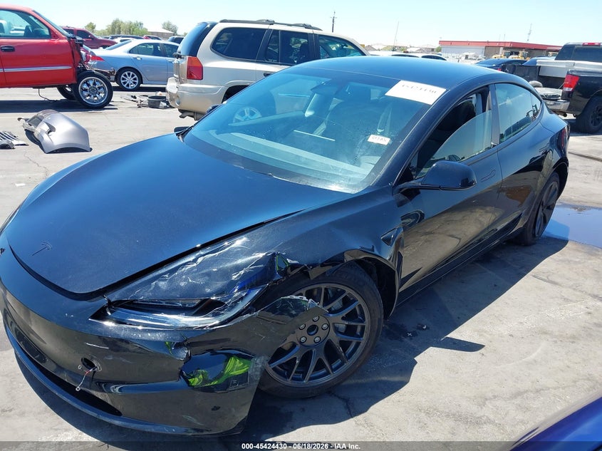 2026 Tesla Model 3 VIN 5YJ3E1EA1TF127433 IAAI salvage auction — LEFT FRONT, Salvage Title, sold $11,600 on 2026-07-28 (photo 6)