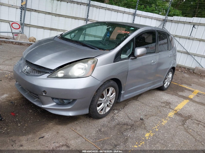 2010 Honda Fit VIN JHMGE8H45AC014688 IAAI salvage auction — NORMAL WEAR, Previous Salvage (Michigan), sold $675 on 2026-07-27 (photo 2)