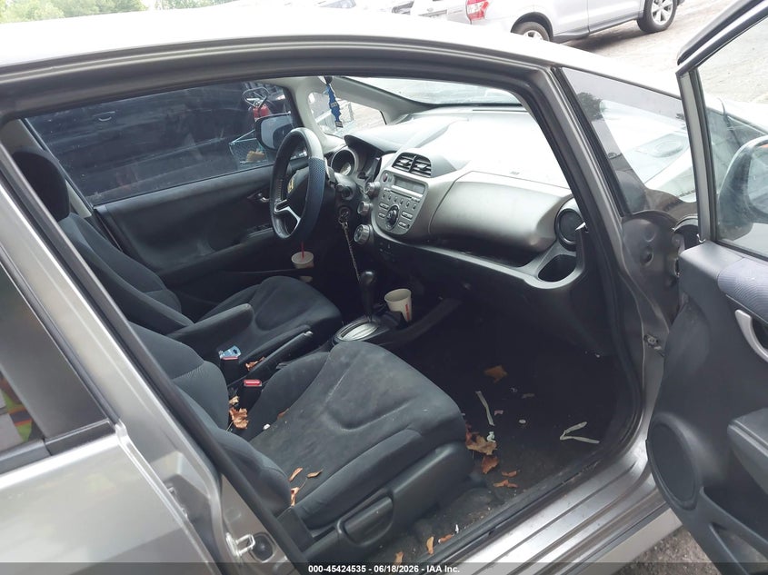 2010 Honda Fit VIN JHMGE8H45AC014688 IAAI salvage auction — NORMAL WEAR, Previous Salvage (Michigan), sold $675 on 2026-07-27 (photo 5)