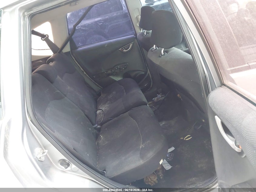 2010 Honda Fit VIN JHMGE8H45AC014688 IAAI salvage auction — NORMAL WEAR, Previous Salvage (Michigan), sold $675 on 2026-07-27 (photo 8)