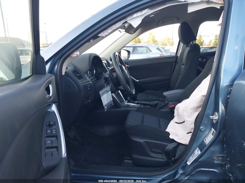 2015 Mazda Cx-5 VIN JM3KE2CY8F0526089 IAAI salvage auction — LEFT SIDE, Salvage Title, sold $3,125 on 2026-07-17 (photo 5)