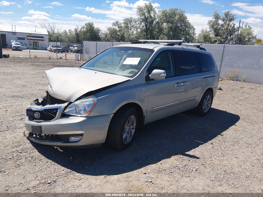 2014 Kia SEDONA VIN KNDMH4C76E6565576 IAAI salvage auction — NORMAL WEAR, Clear (Wisconsin), sold $100 on 2026-07-22 (photo 2)