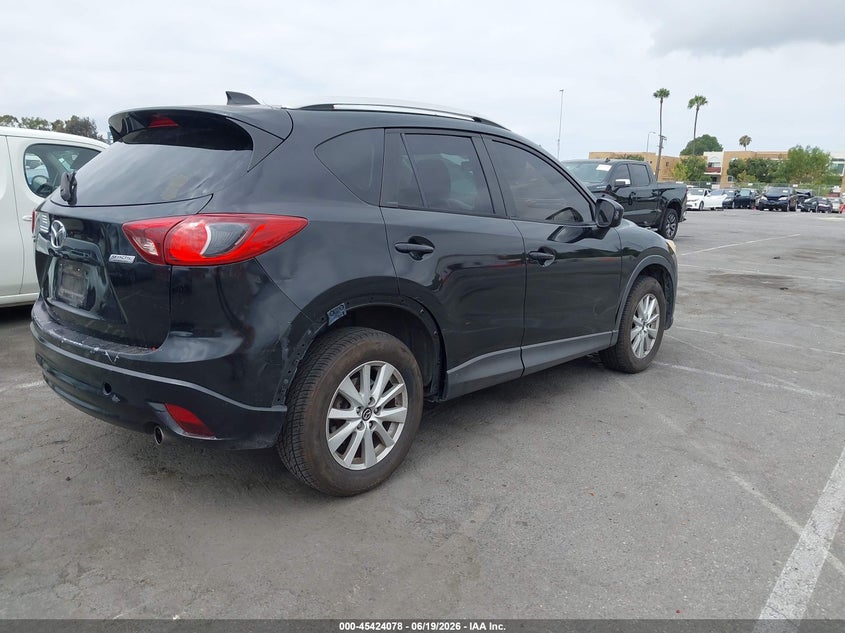 2014 Mazda Cx-5 VIN JM3KE2CY1E0308221 IAAI salvage auction — LEFT SIDE, Salvage (California), sold $2,500 on 2026-07-09 (photo 4)
