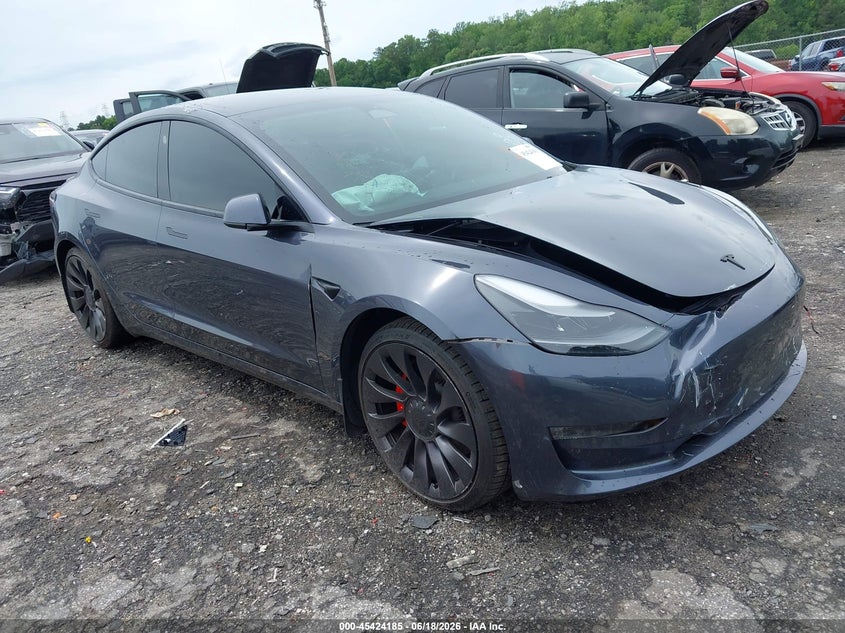 2023 Tesla Model 3 VIN 5YJ3E1EC7PF549620 — IAAI salvage auction photo