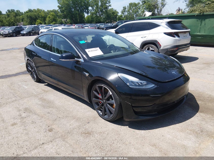 2020 Tesla Model 3 VIN 5YJ3E1EC5LF713280 IAAI salvage auction — RIGHT REAR, Salvage (Kansas), sold $9,200 on 2026-07-23 (photo 1)