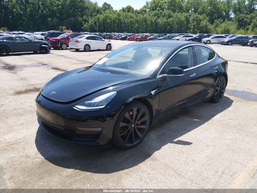 2020 Tesla Model 3 VIN 5YJ3E1EC5LF713280 IAAI salvage auction — RIGHT REAR, Salvage (Kansas), sold $9,200 on 2026-07-23 (photo 2)