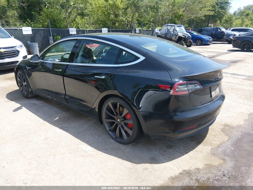 2020 Tesla Model 3 VIN 5YJ3E1EC5LF713280 IAAI salvage auction — RIGHT REAR, Salvage (Kansas), sold $9,200 on 2026-07-23 (photo 3)