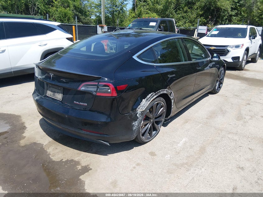 2020 Tesla Model 3 VIN 5YJ3E1EC5LF713280 IAAI salvage auction — RIGHT REAR, Salvage (Kansas), sold $9,200 on 2026-07-23 (photo 4)