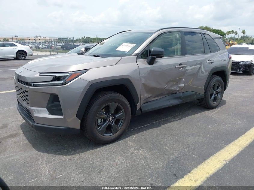 2026 Toyota Rav 4 VIN JTM6DRBVXTD001682 IAAI salvage auction — LEFT SIDE, Salvage Title, sold $19,200 on 2026-07-30 (photo 2)