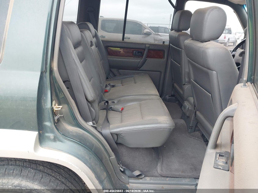 1999 Isuzu Trooper VIN JACDJ58X7X7903999 IAAI salvage auction — NORMAL WEAR, Original (Texas), sold $675 on 2026-07-06 (photo 8)