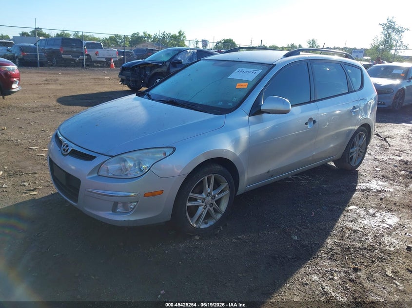 2010 Hyundai Elantra VIN KMHDC8AE9AU060933 IAAI salvage auction — FRONT & REAR, Salvage (Ohio), sold $275 on 2026-07-16 (photo 2)
