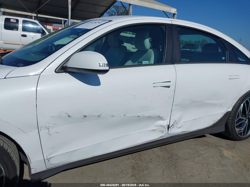 2023 Hyundai Ioniq 6 VIN KMHM34AA0PA048234 IAAI salvage auction — SIDE, Salvage Title, sold $9,200 on 2026-08-15 (photo 6)