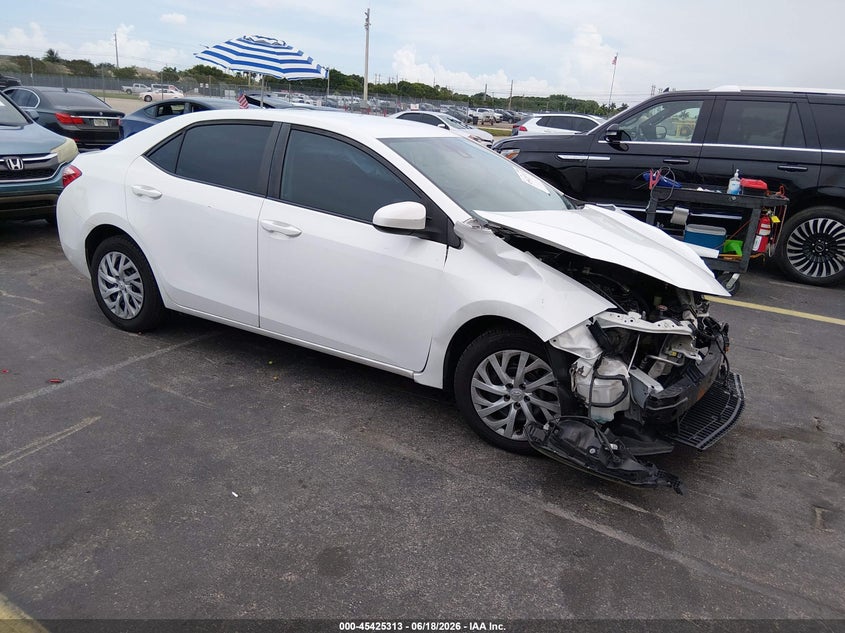 2019 Toyota Corolla VIN 5YFBURHE2KP943467 IAAI salvage auction — LEFT FRONT, Rebuildable (Florida), sold $25 on 2026-07-30 (photo 1)