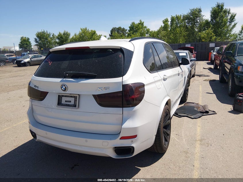 2015 BMW X5 VIN 5UXKR6C54F0J78977 IAAI salvage auction — NORMAL WEAR, Clear (Colorado), sold $1,650 on 2026-07-21 (photo 4)