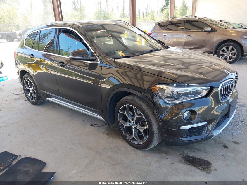 2019 BMW X1 VIN WBXHT3C58K5L36023 IAAI salvage auction — SIDE, Salvage Title, sold $5,200 on 2026-07-11 (photo 1)