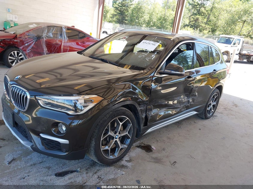 2019 BMW X1 VIN WBXHT3C58K5L36023 IAAI salvage auction — SIDE, Salvage Title, sold $5,200 on 2026-07-11 (photo 2)