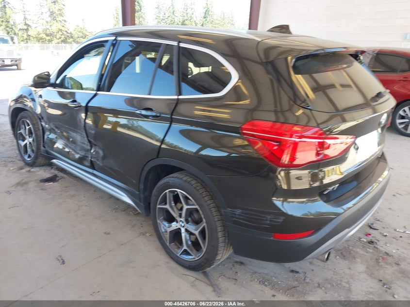 2019 BMW X1 VIN WBXHT3C58K5L36023 IAAI salvage auction — SIDE, Salvage Title, sold $5,200 on 2026-07-11 (photo 3)