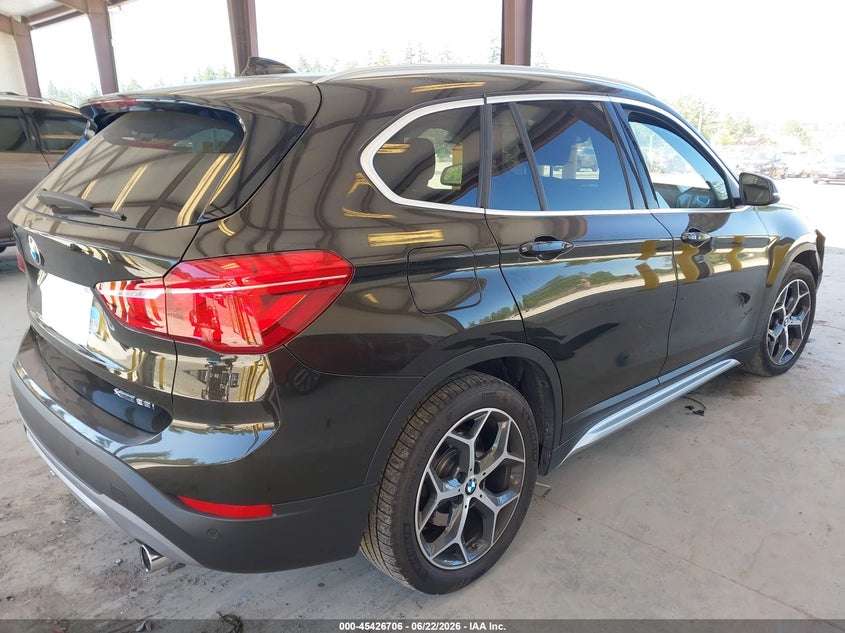 2019 BMW X1 VIN WBXHT3C58K5L36023 IAAI salvage auction — SIDE, Salvage Title, sold $5,200 on 2026-07-11 (photo 4)