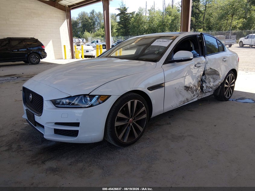 2017 Jaguar Xe VIN SAJAE4BGXHA947299 IAAI salvage auction — LEFT SIDE, Bill Of Sale (Washington), sold $2,450 on 2026-07-15 (photo 2)