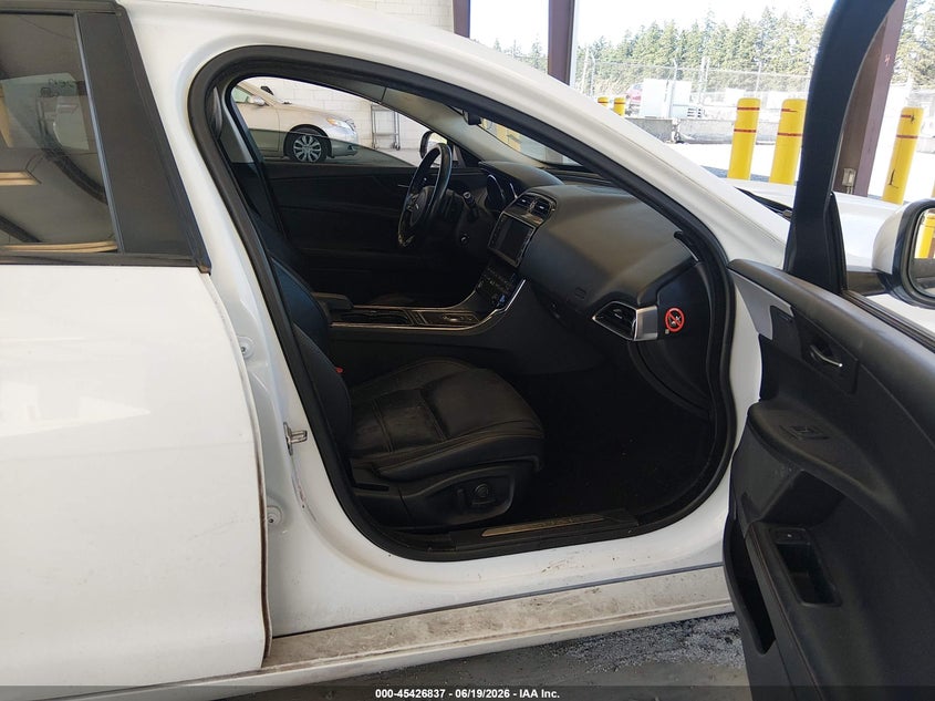 2017 Jaguar Xe VIN SAJAE4BGXHA947299 IAAI salvage auction — LEFT SIDE, Bill Of Sale (Washington), sold $2,450 on 2026-07-15 (photo 5)