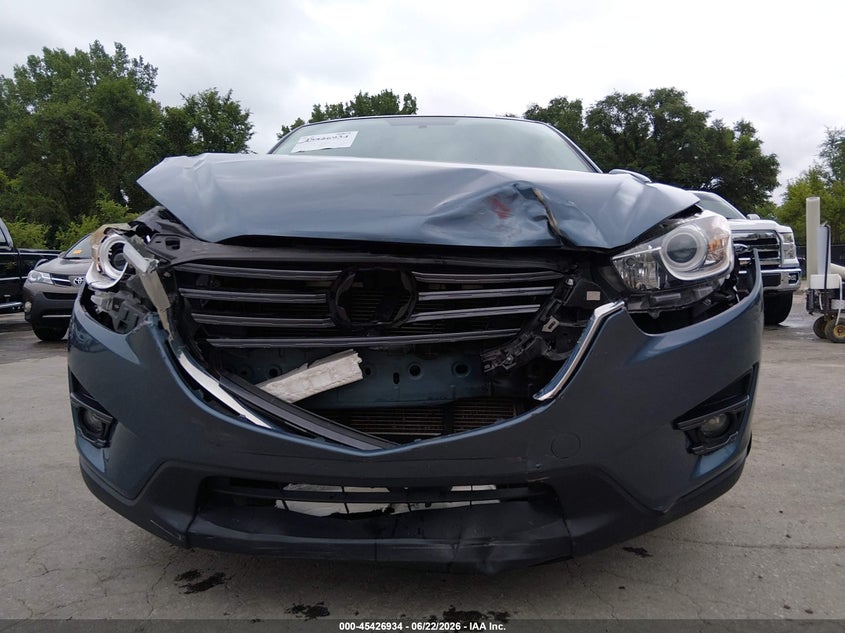 2016 Mazda Cx-5 VIN JM3KE2CY6G0826991 IAAI salvage auction — FRONT END, Salvage (Kansas), sold $2,500 on 2026-07-23 (photo 6)